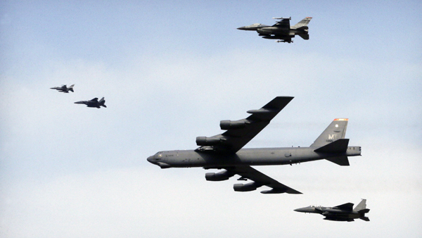 A US air force B-52 bomber flies over Osan Air Base in Pyeongtaek, South Korea, on Sunday (AP photo)